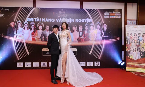 Hoa hậu Mạc Hân Minh trình diễn áo dạ hội của NTK Tommy Nguyễn trong phiên đấu giá thiện nguyện