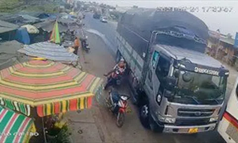 Triệu tập lái xe tải vượt ẩu khiến 2 mẹ con đi xe máy suýt mất mạng